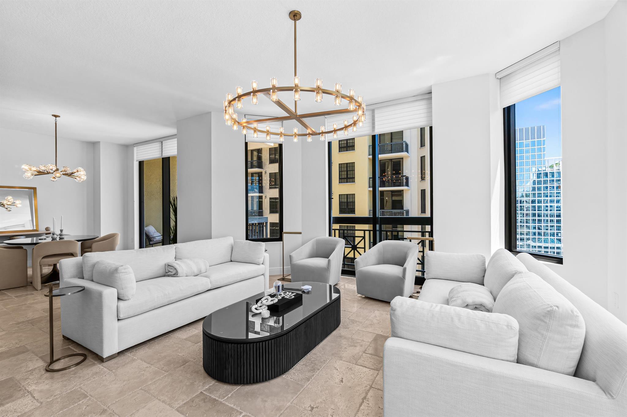 Sophisticated Downtown Luxury with Intracoastal and Ocean Views. Refined living at Two City Plaza, one of downtown West Palm Beach's most coveted addresses. This 2-bedroom, 2 1/2 -bath residence has been custom-designed and curated with the finest finishes. The home features a brand-new modern designer kitchen, Restoration Hardware furnishings and lighting that blend modern elegance with timeless style. Floor-to-ceiling impact windows flood the space with natural light and frame views of the water and city skyline. Both bedrooms offer en-suite bathrooms, while the spacious open corner floor plan is perfect for entertaining. Ideal as a corporate residence, seasonal showcase, or year-round retreat, this residence redefines downtown luxury with a seamless blend of comfort and design. Resident