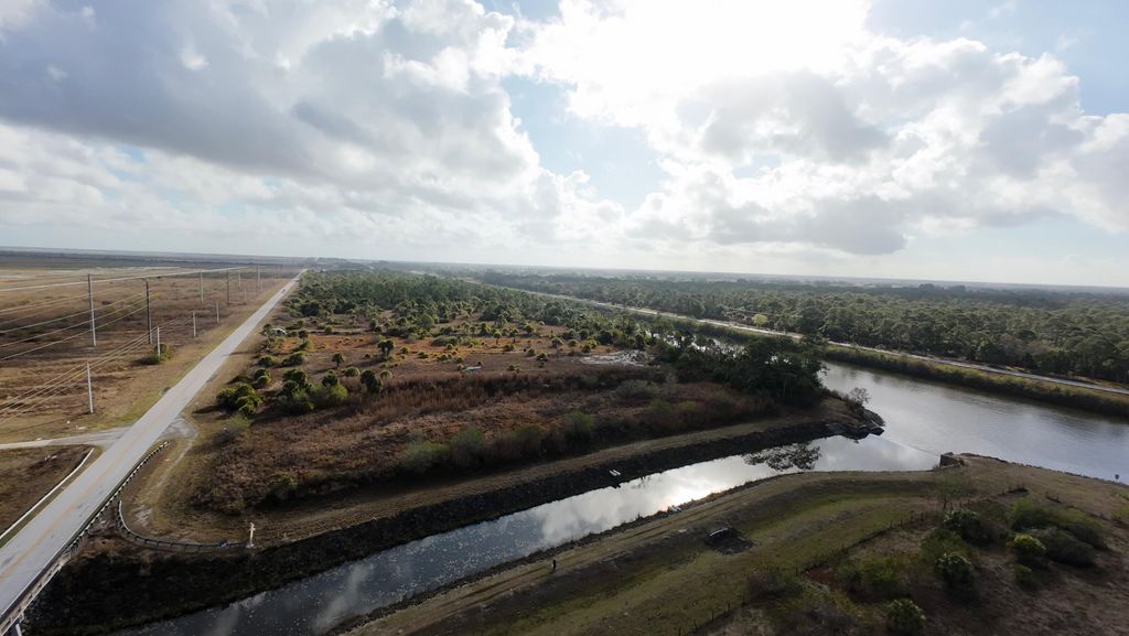 Photo of 0 SW Citrus Boulevard, Palm City, FL 34990 (MLS # B26004157)