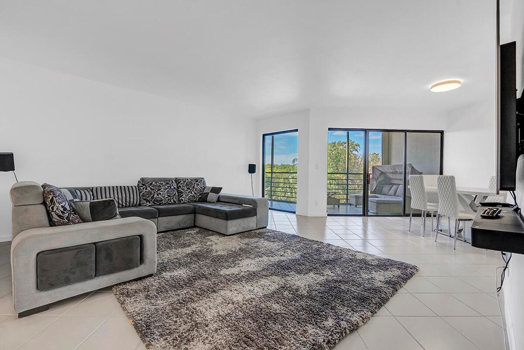 Photo of 5749 Camino Del Sol #404, Boca Raton, FL 33433 (MLS # B26016873)