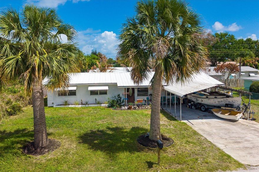 Opportunity meets location in Jensen Beach. This CBS 3BR/2BA home sits on a corner lot in a quiet, established neighborhood just minutes to beaches, downtown, shopping, and top-rated schools. Featuring a functional layout with multiple living areas, a converted garage for added flexibility, and a Florida room for extra space, this home offers options for primary living, seasonal use, or investment. Metal roof and whole-house generator provide long-term peace of mind. Fenced yard adds privacy with room to enhance outdoor living. Properties in this location with this level of potential are getting harder to find. Move in, update, and create value in one of Martin County's most desirable areas.