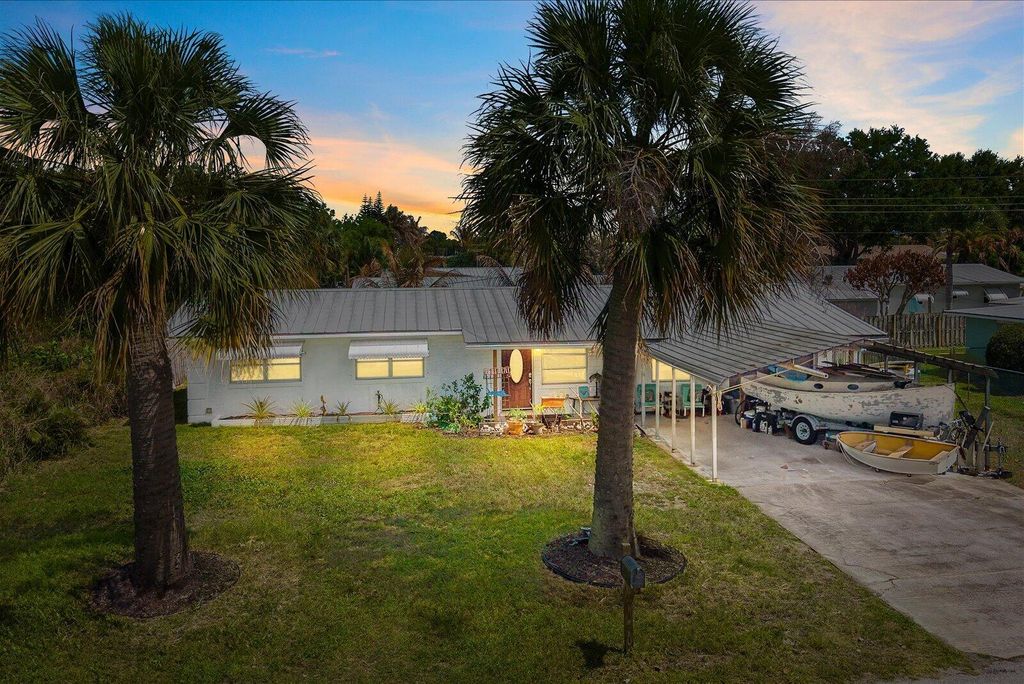 Photo of 3141 NE Spruce Ridge Avenue, Jensen Beach, FL 34957 (MLS # B26010429)