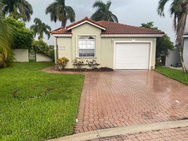 Photo of 10627 NW 7TH Street, Pembroke Pines, FL 33026 (MLS # B26080922)