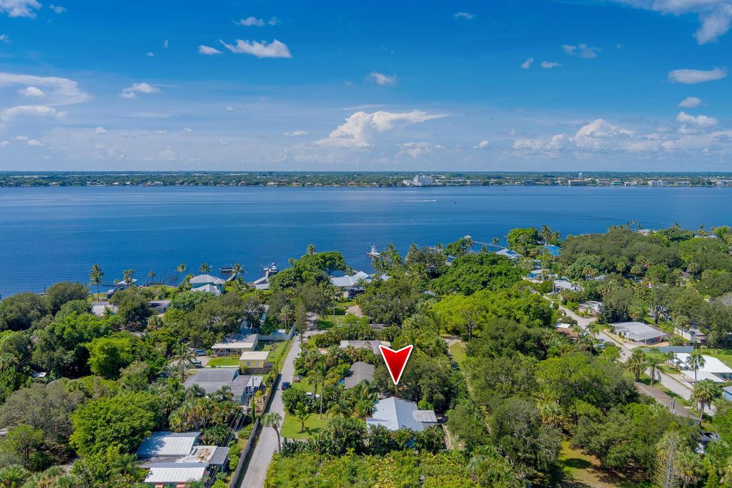 Photo of 1020 NE Key Drive, Jensen Beach, FL 34957 (MLS # R10913968)