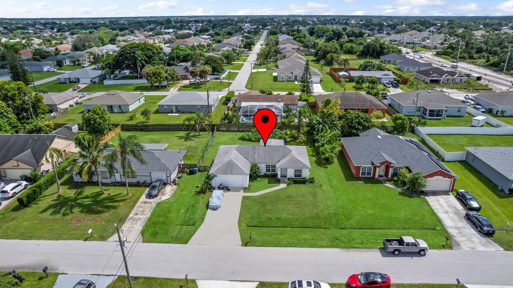 Photo of 868 SW Trouville Avenue, Port Saint Lucie, FL 34953 (MLS # R11019402)