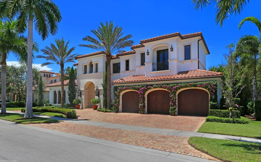 **Golf Membership may be available upon purchase**  From the moment you walk into this opulent custom home with lots of glass, large rooms and too many upgrades to mention, you will fall in love. The exquisitely designed architecture includes Barrel Ceilings, Volume Ceilings and Decorative Ceilings giving each room a feel of wide open spaces. The kitchen is a chef's dream with stainless steel Thermador appliances, fantastic long island with tons of storage, dishwashers, butler's pantry, walk-in pantry, built-in seating area, large vented cooktop and desk are just some of the kitchen upgrades. The open family room flows off the kitchen and leads to the fantastic lanai and outdoor entertaining area including a grand pool and spa plus a summer kitchen and an outdoor