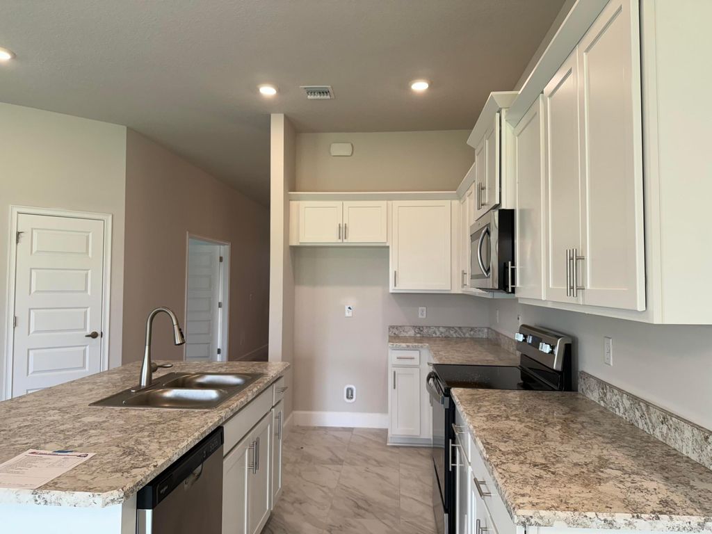 Photo of 5631 Lugo Street, Fort Pierce, FL 34951 (MLS # R10988443)