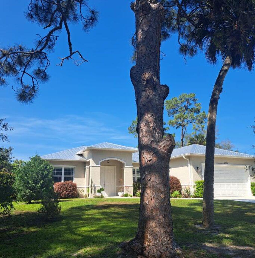 Photo of 1206 Royal Palm Boulevard, Fort Pierce, FL 34982 (MLS # R11078052)