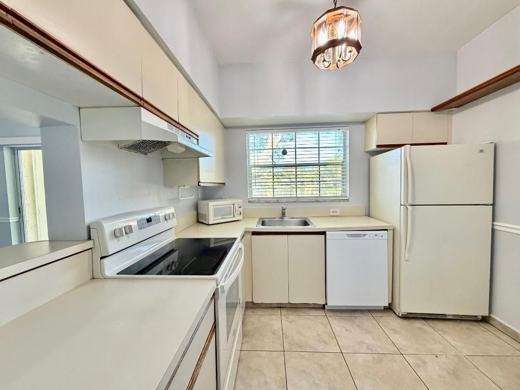 Photo of 651 Cypress Lake Boulevard #M, Deerfield Beach, FL 33064 (MLS # R11141057)