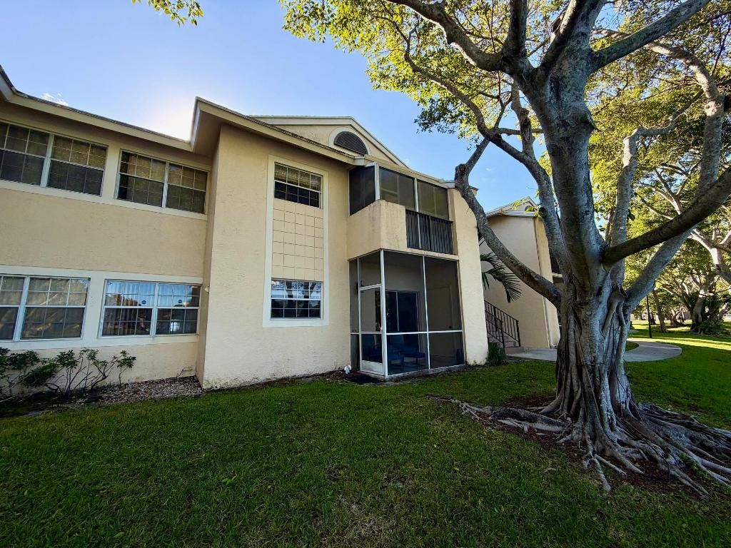 Photo of 651 Cypress Lake Boulevard #M, Deerfield Beach, FL 33064 (MLS # R11141057)