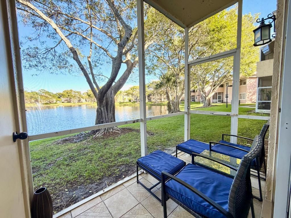 Photo of 651 Cypress Lake Boulevard #M, Deerfield Beach, FL 33064 (MLS # R11141057)