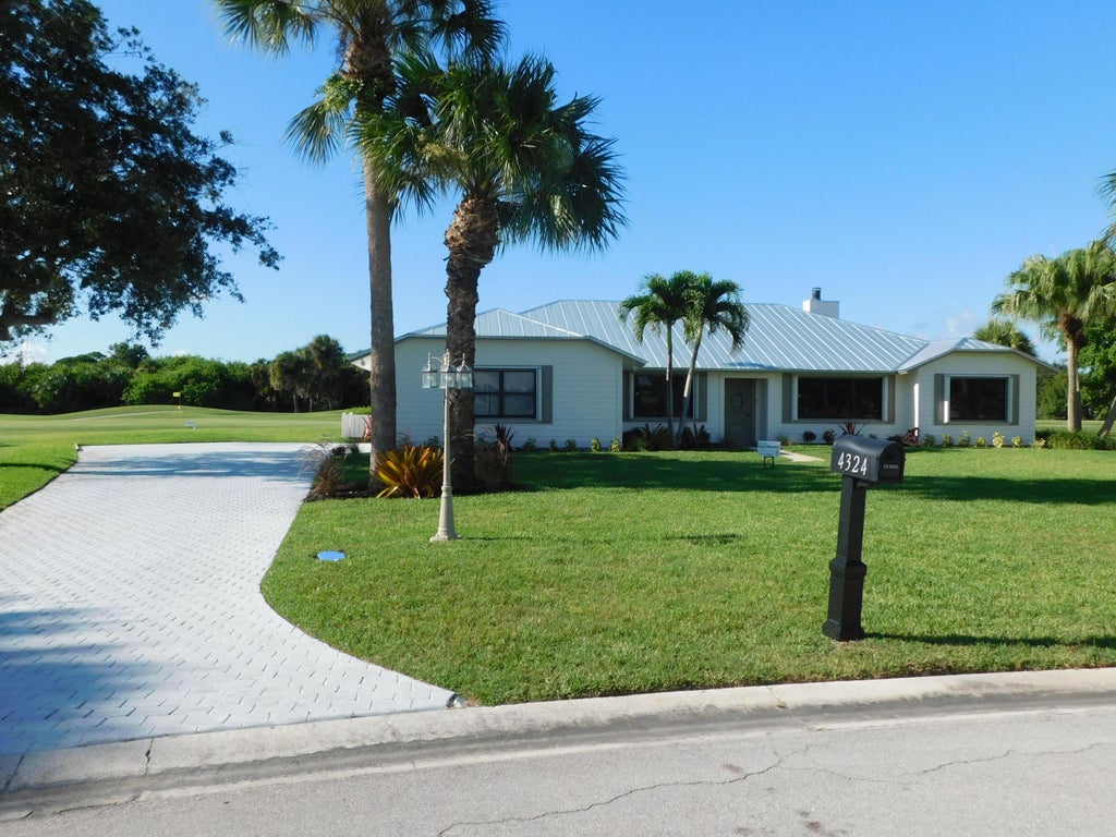 Photo of 4324 GATOR TRACE Circle, Fort Pierce, FL 34982 (MLS # B26079100)