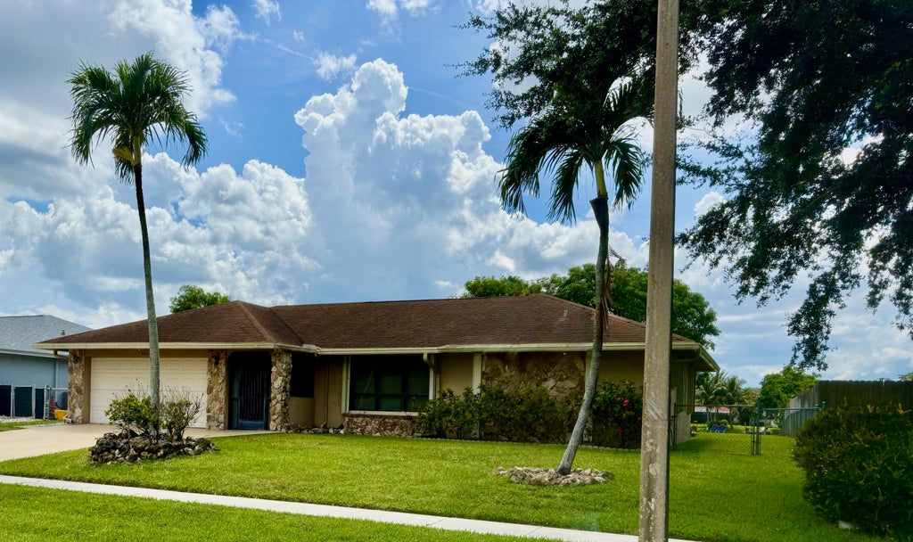 Photo of 264 Las Palmas Street, Royal Palm Beach, FL 33411 (MLS # B26042704)