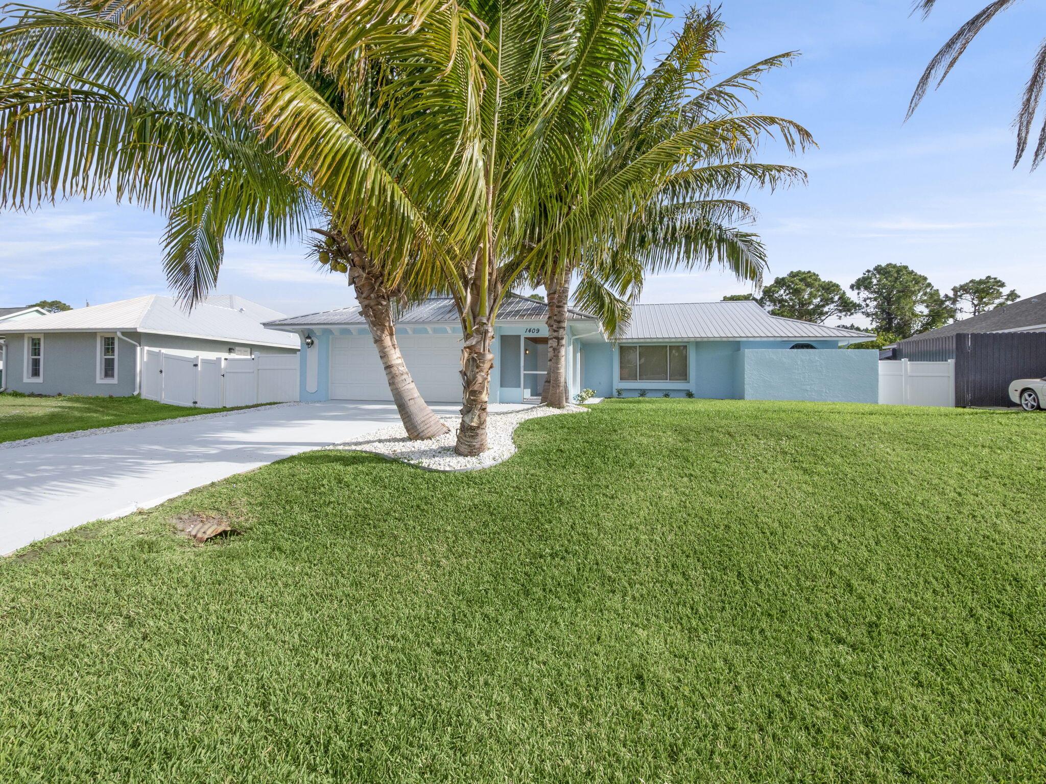 Welcome to your tropical oasis! This beautifully maintained 3-bedroom, 2-bath home boasts a refreshing pool that was recently refinished, a covered lanai, and a fully fenced PVC yard with no rear neighbors for ultimate privacy. The updated kitchen features granite counters, new stainless steel appliances, and a large sliding window facing the pool and lanai. Vaulted ceilings and tile floors throughout create an airy, elegant feel. Enjoy a split-bedroom floor plan with modernized bathrooms and a larger 2-car garage perfect for extra storage. A new metal roof (2023) adds lasting value. Ideally located near shopping, dining, schools, and major highways for easy commuting. Paradise is callinga''schedule your showing today!