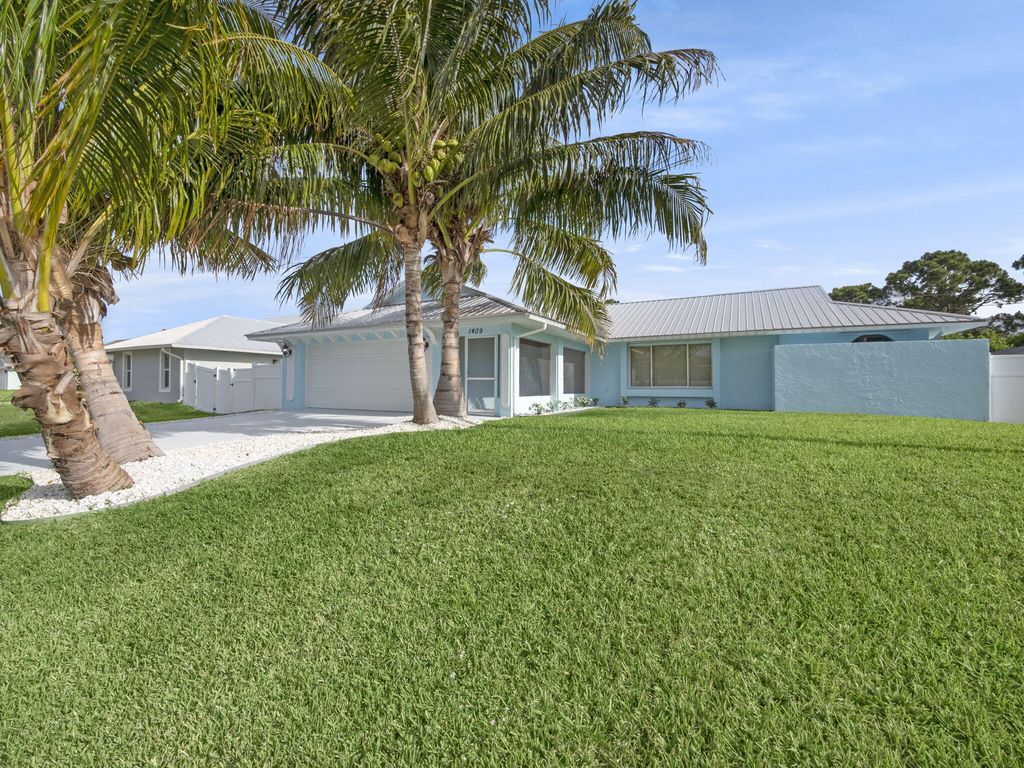 Photo of 1409 SW Aachen Avenue, Port Saint Lucie, FL 34953 (MLS # R11085085)