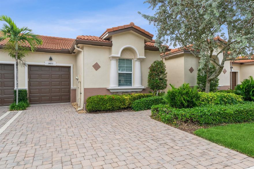 Rarely available  newer  (built in 2014 ) man gated, one story immaculate and updated  villa  with 2 bedrooms plus Den, 2 full bathrooms, 1 Car Garage, with a serene & spacious backyard.   Recent updates include a new air conditioner, new quartz counters, range & washing machine installed in 2021, new vinyl floor in master bedroom, home was recently painted, impact windows, crown molding, 2 walk-in showers.  Walking distance to fabulous clubhouse with cafe, tennis & pickle ball courts, gym, bocce. 2 resort style pools, world class entertainment.  LOCATION, LOCATION, close to beach, downtown Delray, restaurants, shopping and movie theatre. This is a 55+ community.