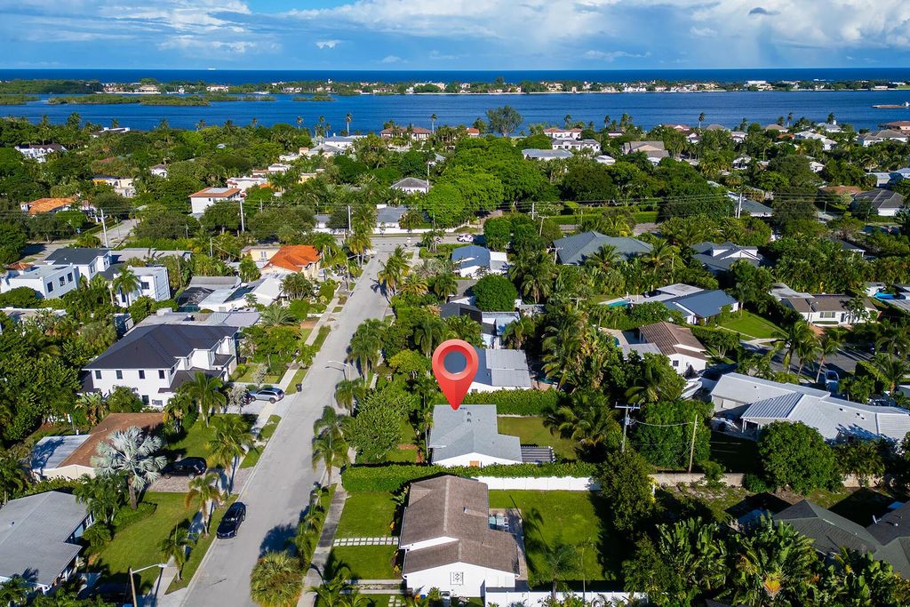 Photo of 328 Putnam Ranch Road, West Palm Beach, FL 33405 (MLS # R11128239)