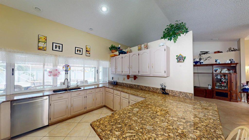 Photo of 3900 SW Kabane Street, Port Saint Lucie, FL 34953 (MLS # R11072137)