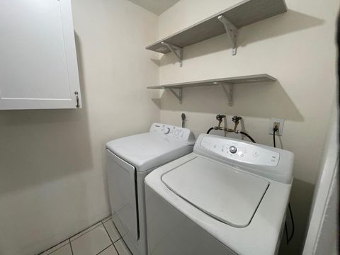 Tiny photo for 7624 SW 10th Street, North Lauderdale, FL 33068 (MLS # B26018046)