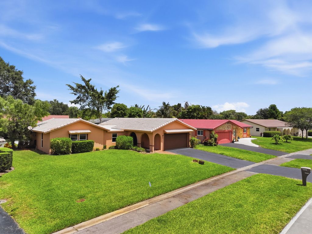 Photo of 8557 Shadow Wood Boulevard, Coral Springs, FL 33071 (MLS # B26021625)