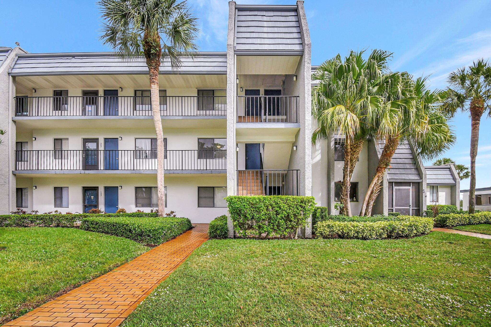 Enjoy a full lake view from extended living area in this 2/2 renovated to perfection corner condo. Luxurious at its finest with a warm ambiance & natural sunlight. Enjoyed your oversized kitchen w. wall down, newer appliances & so much storage with walk in closets & pantry. Your washer/dryer is built into a custom-made closet. Beautiful quartz counter tops, blue glass back splash & wonderful crown moldings. Your community pool is right out your front door. Experience the peace & ambiance of manned guard gates & 24-hour security patrols all located on lush, tropical grounds. This amazing location is minutes away from Fla. Turnpike, I95, airports, medical centers, places of worship, great restaurants, entertainment, shopping, polo grounds & wonderful beaches.