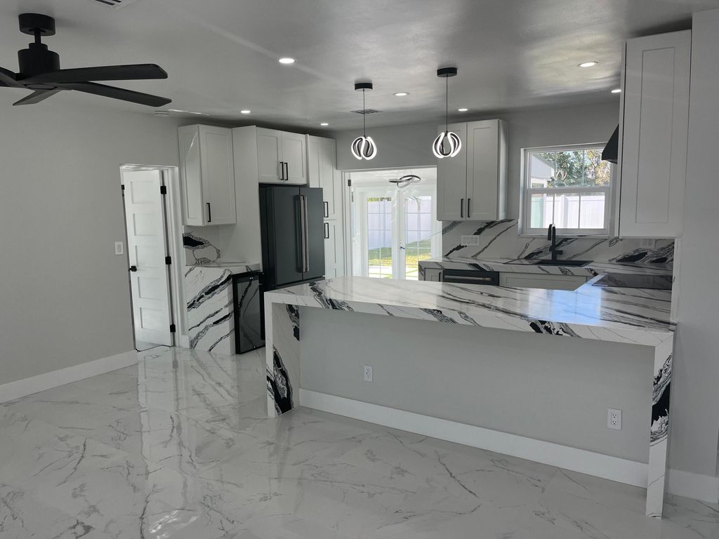 Photo of 355 Maddock Street, West Palm Beach, FL 33405 (MLS # B26027955)