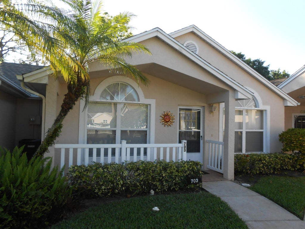 Photo of 703 NW San Remo Circle, Port Saint Lucie, FL 34986 (MLS # B26046220)