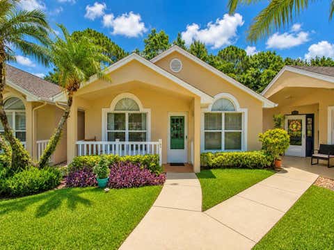 Photo of 703 NW San Remo Circle, Port Saint Lucie, FL 34986 (MLS # B26046220)