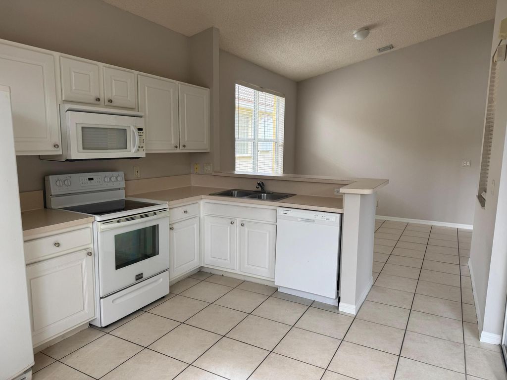 Photo of 9452 Verona Lakes Boulevard, Boynton Beach, FL 33472 (MLS # R11159322)