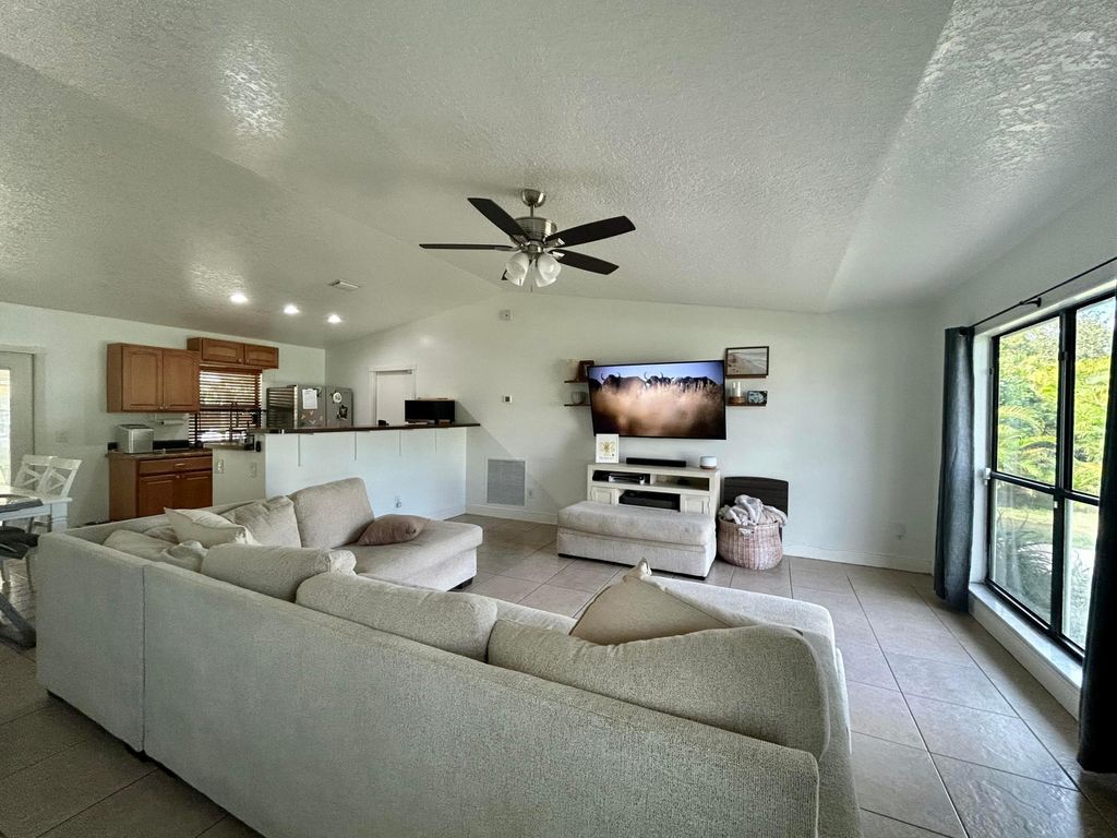 Photo of 452 SW David Terrace, Port Saint Lucie, FL 34953 (MLS # R11145921)