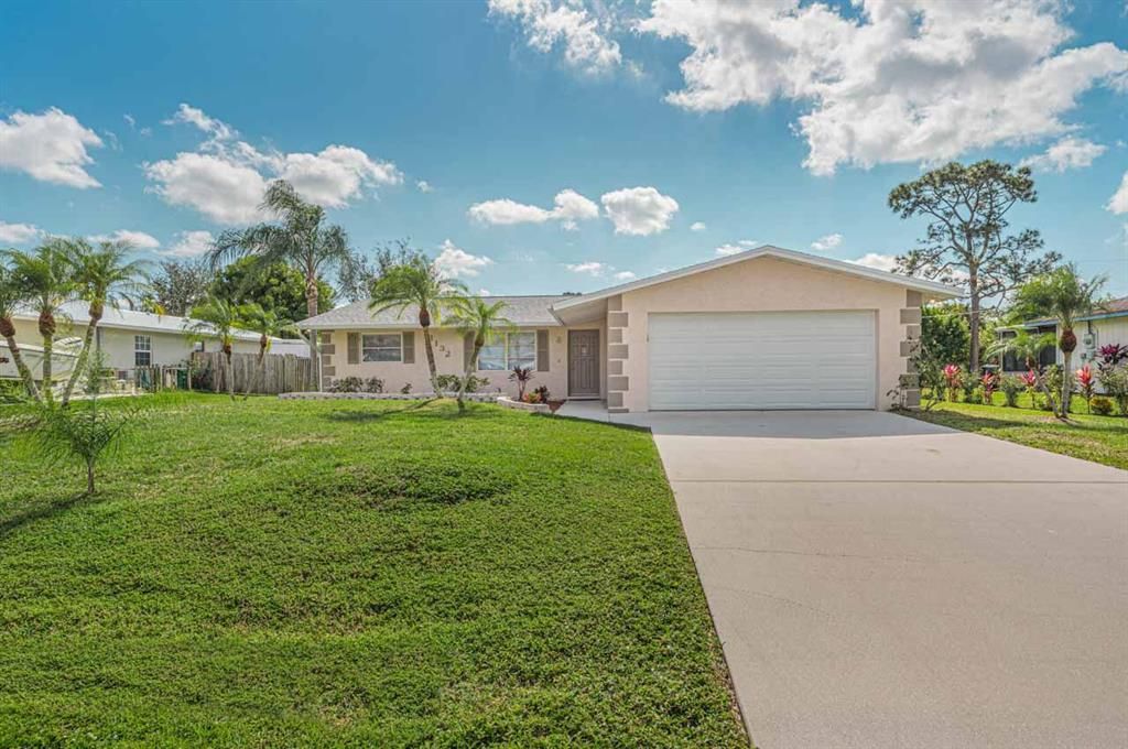 Photo of 1132 SE Palm Beach Road, Port St Lucie, FL 34952 (MLS # R10860400)