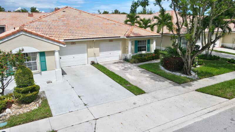 Photo of 6183 FLORAL LAKES Drive, Delray Beach, FL 33484 (MLS # B26069957)