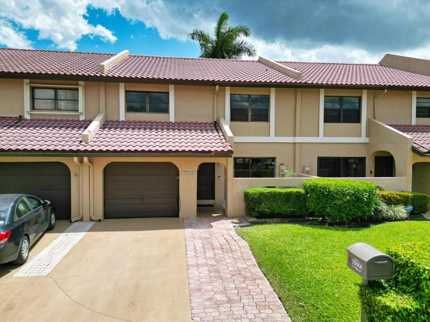 Rare opportunity to own 1 of only 4 townhomes in the community with a private groundfloor entrance and centered lake view. Quietly set at the rear of the community, this residence offers over 2,000 sq ft of bright, functional living space. All 3 bedrooms are upstairs, including a spacious primary suite with a lakeview balcony and walkin closet. The main level features a large living area with high ceilings, an eatin kitchen with a separate dining area, and multiple sliding glass doors bringing in abundant natural light. A large underthestairs storage/playroom provides valuable extra space. Also include as 1 car garage plus 2 driveway spaces, community pool and clubhouse. Located in Boca Raton's Arated school district and within walking distance to houses of worship.