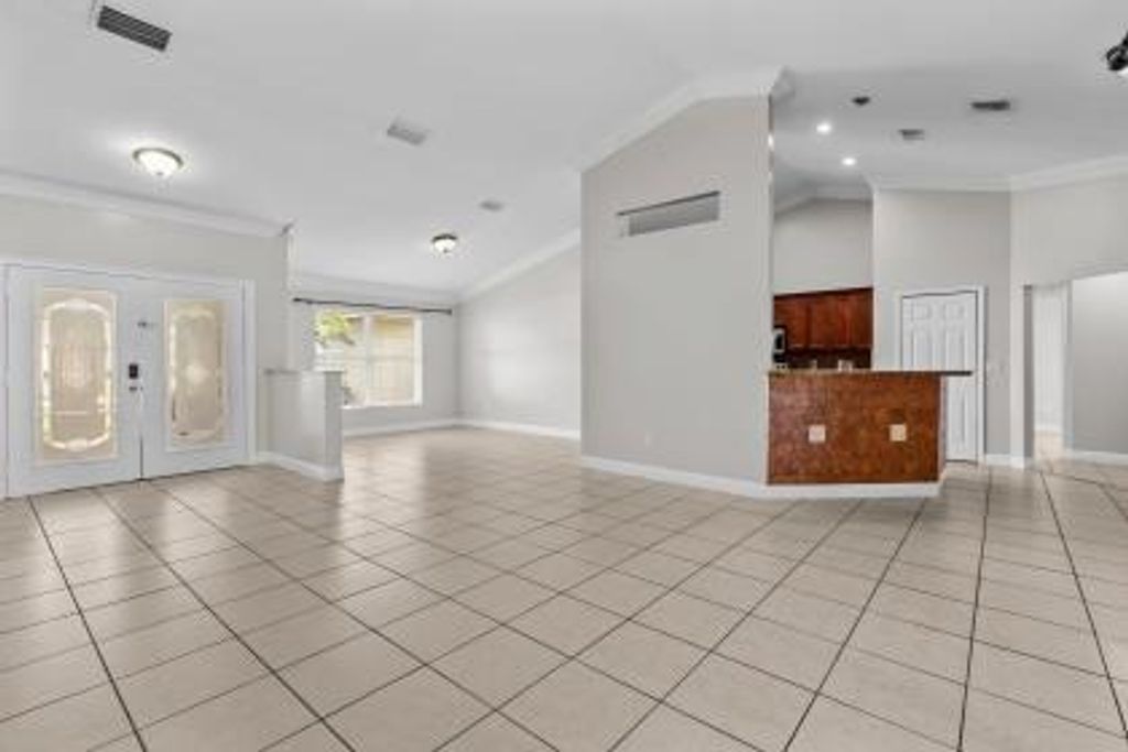 Photo of 3718 SW Masilunas Street, Port Saint Lucie, FL 34953 (MLS # R11132271)