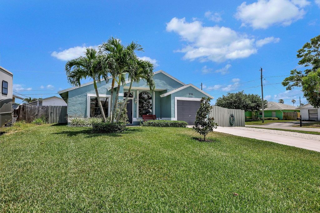 Photo of 5735 SE Mitzi Lane, Stuart, FL 34997 (MLS # R10984876)