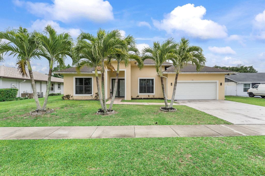 Photo of 123 Bilbao Street, Royal Palm Beach, FL 33411 (MLS # B26018906)