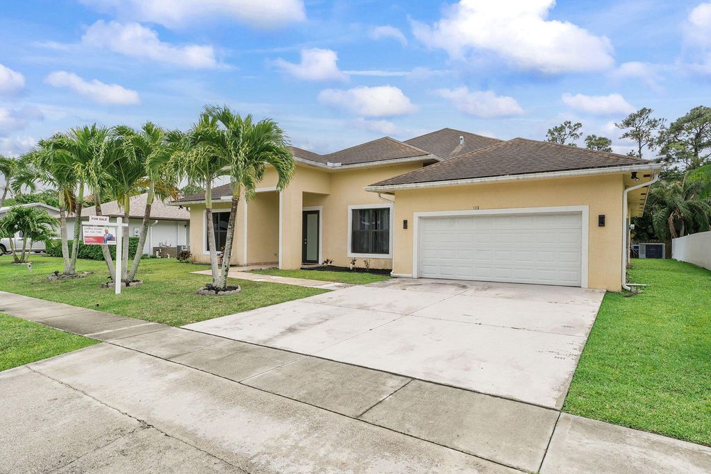Photo of 123 Bilbao Street, Royal Palm Beach, FL 33411 (MLS # B26018906)