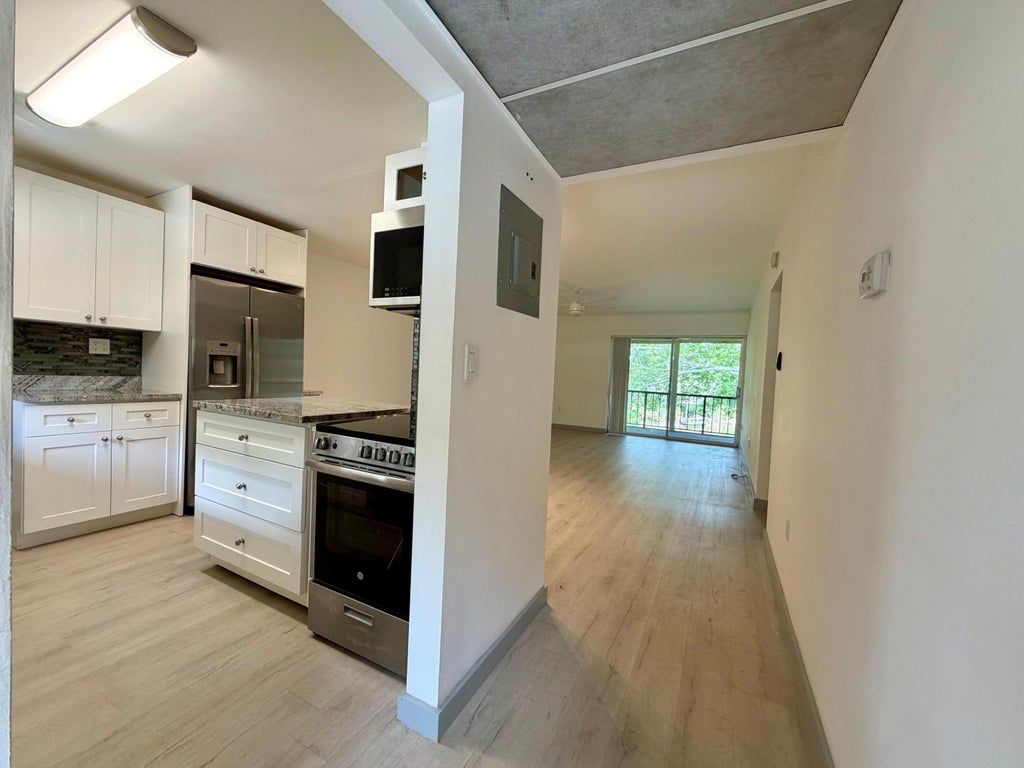 Photo of 848 SW 9th Street Circle #203, Boca Raton, FL 33486 (MLS # B26074320)