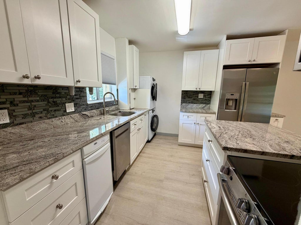 Photo of 848 SW 9th Street Circle #203, Boca Raton, FL 33486 (MLS # B26074320)