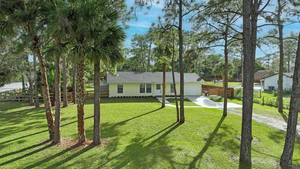 Photo of 11032 51st Court N, The Acreage, FL 33411 (MLS # R10938139)