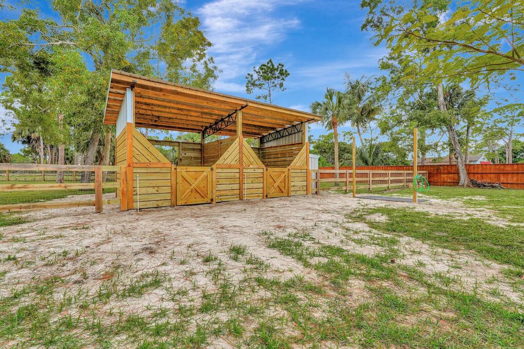 Photo of 11032 51st Court N, The Acreage, FL 33411 (MLS # R10938139)