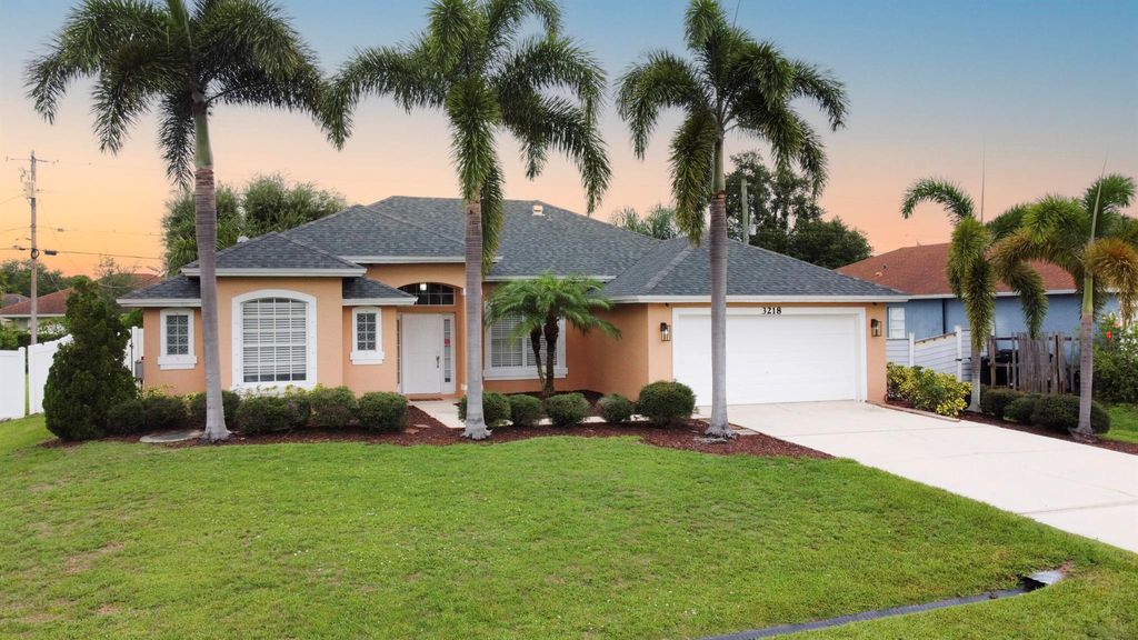 Photo of 3218 SW Crumpacker Street, Port Saint Lucie, FL 34953 (MLS # R11096792)
