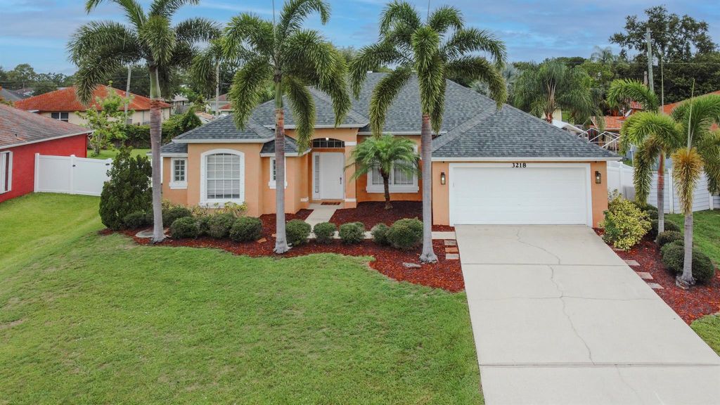 Photo of 3218 SW Crumpacker Street, Port Saint Lucie, FL 34953 (MLS # R11096792)