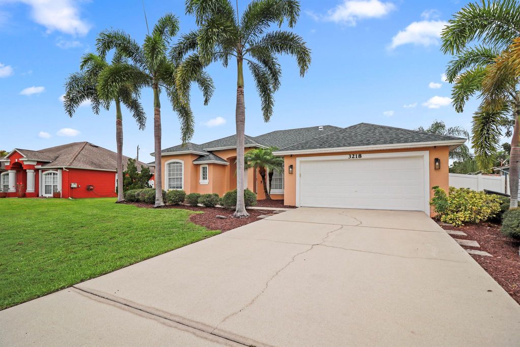 Photo of 3218 SW Crumpacker Street, Port Saint Lucie, FL 34953 (MLS # R11096792)