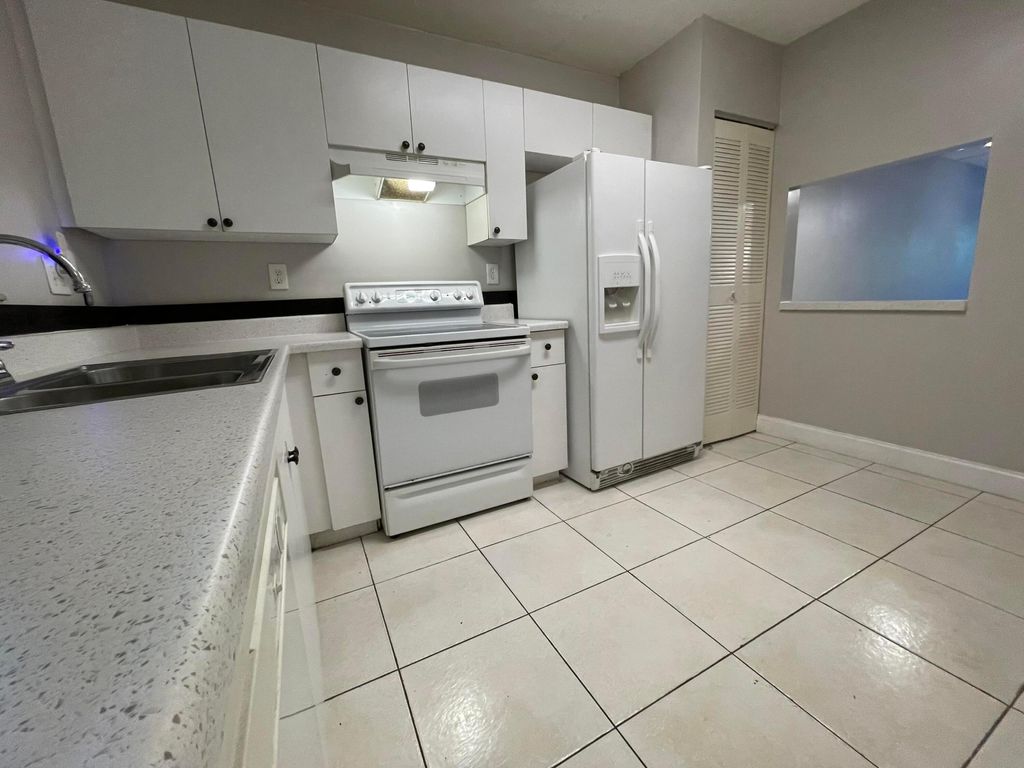 Photo of 2967 Riverside Drive, Coral Springs, FL 33065 (MLS # B26027468)
