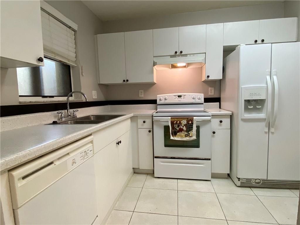 Photo of 2967 Riverside Drive, Coral Springs, FL 33065 (MLS # B26027468)
