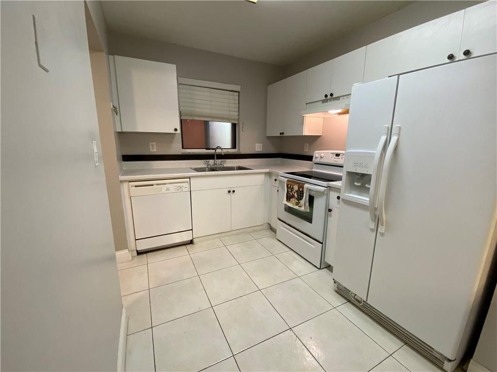 Photo of 2967 Riverside Drive, Coral Springs, FL 33065 (MLS # B26027468)
