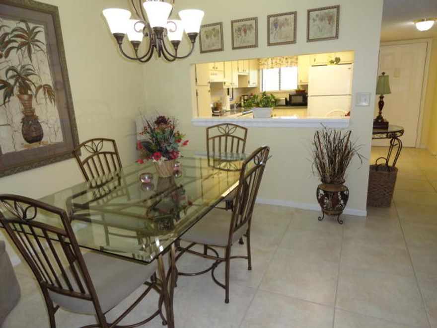 IMMACUATE ATTRACTIVE CORNER CONDO CONVENIENTLY LOCATED JUST OFF THE ELEVATOR LOBBY.UPDATED TILED LIVING AREAS, EAT-IN KITCHEN WITH UPDATED APPLIANCES, CEILING WITH HI-HATS, PULL OUT DRAWS, & APPLIANCES INCLUDING MICROWAVE, UPDATED MASTER BTH VANITY, NEW WATER HEATER. THIS IS AN EXCEPTIONAL HOME WITH NICE POOL VIEWS.  GREAT LOCATION NEAR THE CLUBHOUSE & MAIN POOL & A FEW BUILDINGS AWAY FROM THE ADDITIONAL COMMUNITY POOL. SPRING LAKES IS 15 MINUTES TO THE AIRPORT, MINUTES TO THE FLORIDA TURNPIKE,WELLINGTON'S GREEN MALL, RESTAURANTS, SHOPPING, ENTERTAINMENT & BEACHES.