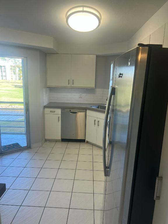 POINCIANA PLACE CONDO A,B AND C - Residential