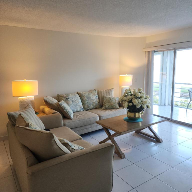 POINCIANA PLACE CONDO A,B AND C - Residential