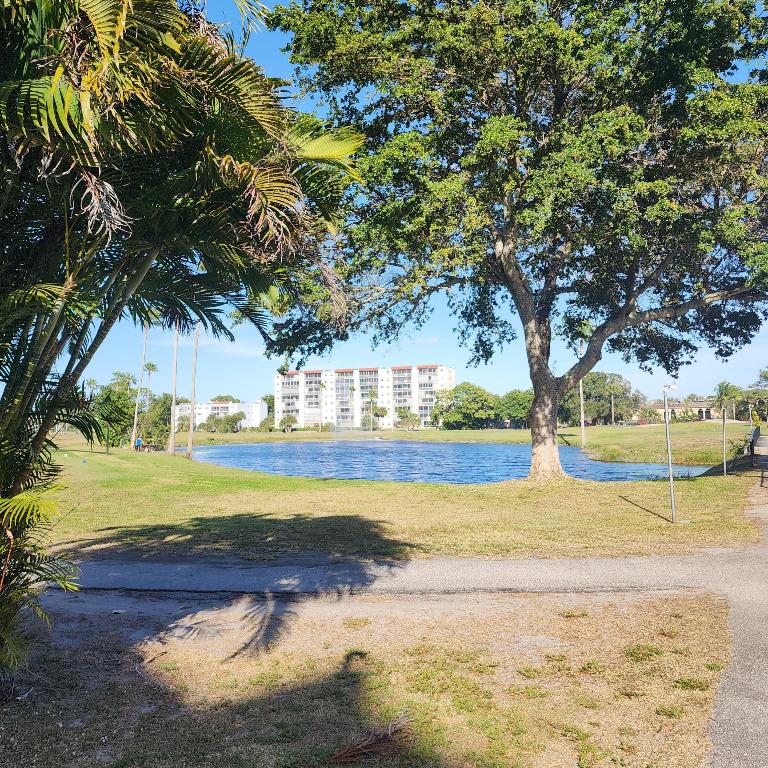 POINCIANA PLACE CONDO A,B AND C - Residential